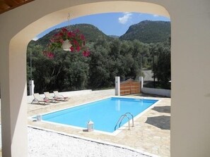 View of the pool and the mountains.