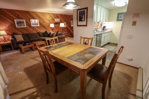 Chair, Furniture, Couch, Flooring, Dining Table