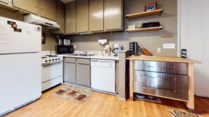 Room, Indoors, Flooring, Hardwood, Refrigerator