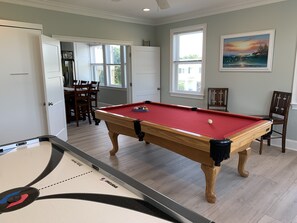 Game room with pool table and the kids favorite air hockey.