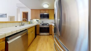 Room, Indoors, Flooring, Kitchen, Hardwood