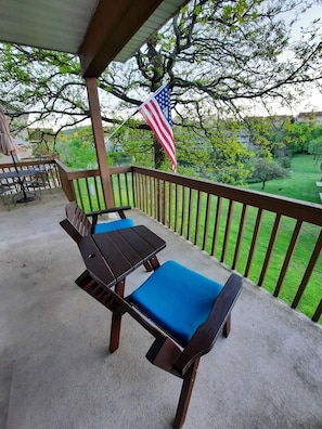 Relax & enjoy a coffee on your covered balcony with a nice view of the water!