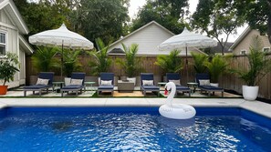 New salt water pool with heater/chiller, putting green, firepit, & grill