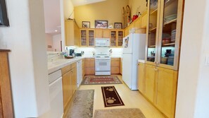 Indoors, Room, Kitchen, Flooring, Refrigerator