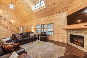Gorgeous windows make this cabin open and airy.  Sofa opens to a bed.  