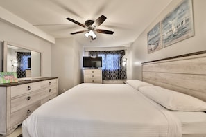 Master bedroom with a king size bed!