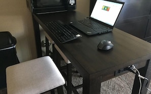 Functional work space. USB charging station in table. Lake view!