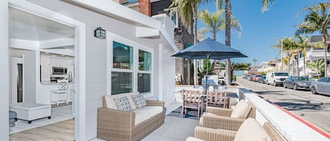 Just nine homes from the sand, this bright and cheery home makes vacationing at the beach a breeze.