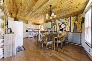 Kitchen and dining area, table seats 7 and the counter seats 5.