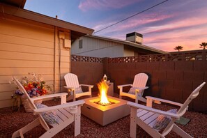 Gather around and stay warm by our cozy firepit