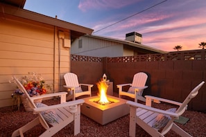 Gather around and stay warm by our cozy firepit