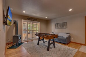 Loft with Full pullout sleeper sofa and foosball