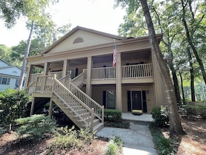 Front of Condo - Second Floor Right with Flag.