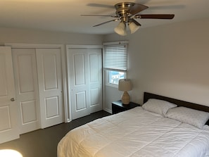 Bedroom with queen bed and double closets 