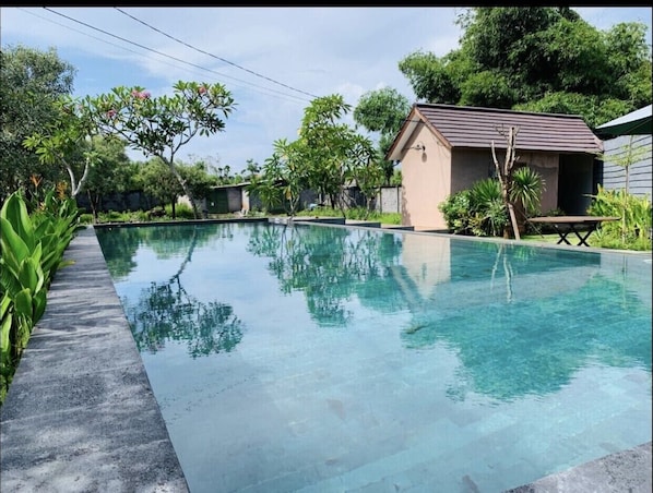 Public Swimming pool located at the BBQ area outside the Villa in the Complex 