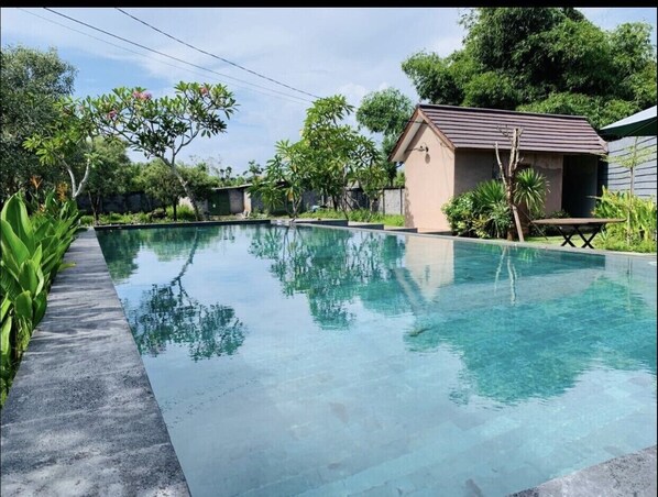 Public Swimming pool located at the BBQ area outside the Villa in the Complex 