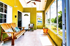 Relax in our enclosed front porch