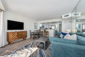 Family room with sleeper sofa and large smart TV