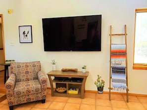 80" Flatscreen TV in Living room (visible from kitchen and dining room)