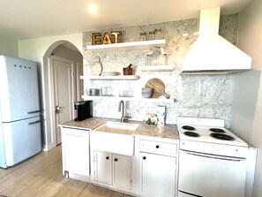 Chef’s kitchen for cooking or baking. Both Keurig and drip coffee makers.