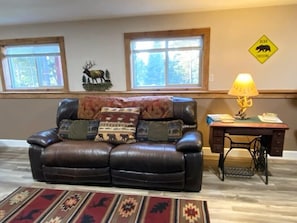 Leather reclining sofa.
