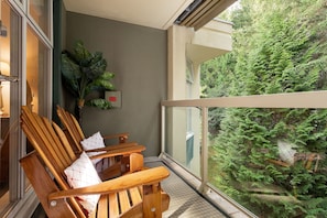 Private balcony with forested views