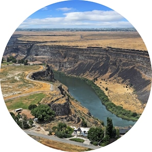 Look closely to see kayaks on river, bike trail along rim, and Perrine Bridge!