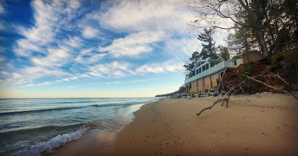 View of the house from the sandy beach right outside your door!