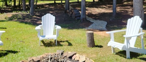 Enjoy s'mores by the fire pit, just a quick walk down the path. Wood provided.