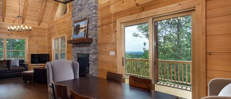 Welcome to Shortoff Mountain Retreat— a luxurious log cabin that offers a spacious deck & seasonal views!