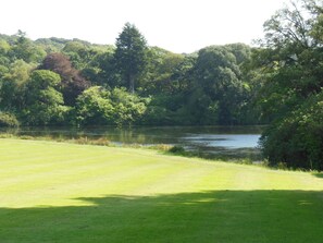 The main lawn leading down to the boating lake