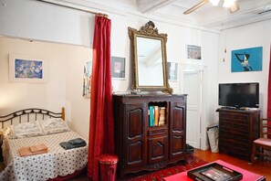 Living room, TV unit and second bedroom