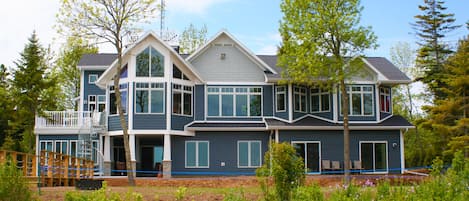 Spring at Cana Pointe - Exterior of Home-facing Lake Michigan