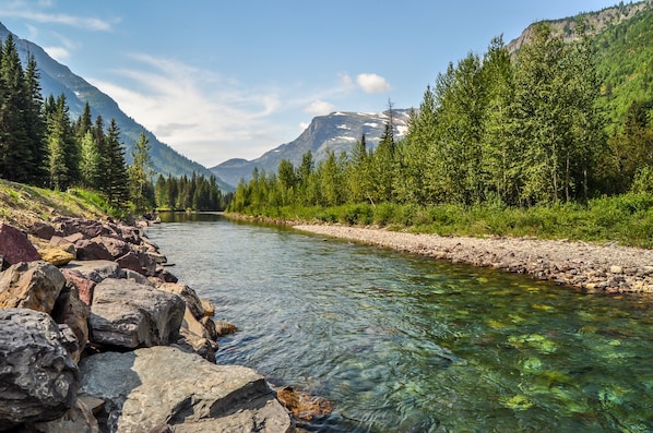 Riverfront getaway with 10 acres on the pristine, fishable Kootenai River.