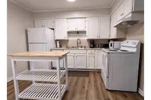 Fully stocked kitchen with island