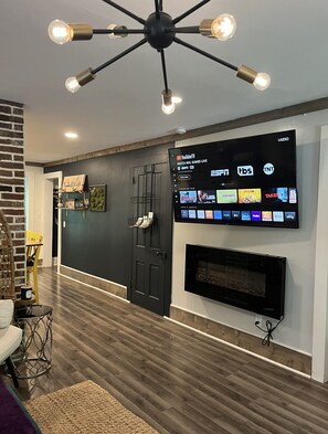 65 inch smart tv.
Watch free tv or or own apps.