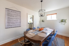 Dining room table has seating for eight. (1st Floor)
