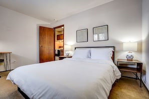 Queen Bed with two nightstands for reading!