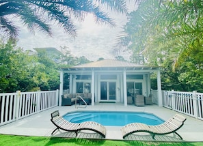 Relaxing, private backyard oasis with heated saltwater pool.