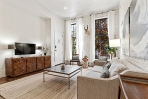 Living room space with huge windows 