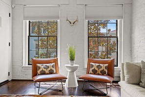 Beautiful view of the living room, seating perfect for enjoying a cup of coffee