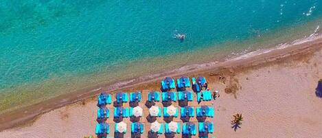 Enjoy the pristine beauty of Glifada Beach, just 3 km away, where crystal-clear waters await your relaxation