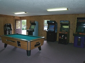 Coin  Operated Pool Table and Video Games located in the Clubhouse