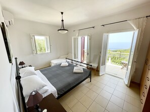 Bedroom 1 - wake up overlooking the sea and have coffee on the balcony