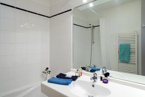 Freshen up in the bathroom after a day of adventure.