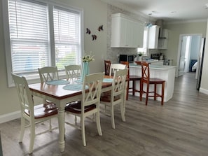 Dining area looking into kitchen.  Open door is 1st floor bedroom