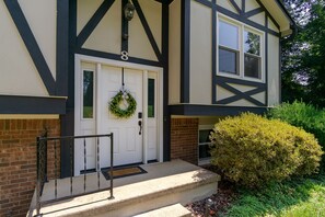 Front Door equipped with smart lock for easy access. 