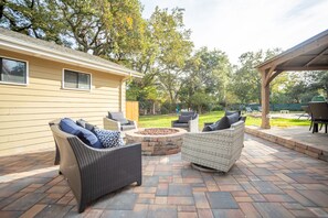 Firepit lounge with comfortable outdoor seating.