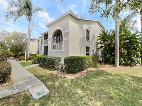 Front view of this second story corner unit in Stoneybrook.