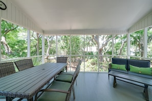 Outdoor living on the screened porch